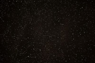 Low angle view of stars in sky at night