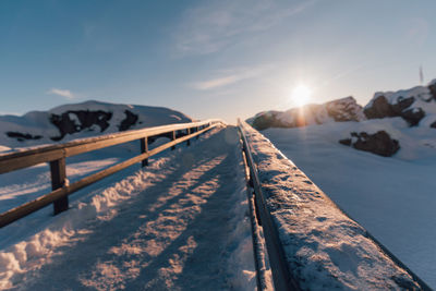 Scenic view of snow covered mountains against sky