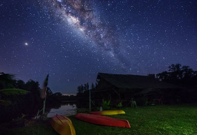 Scenic view of field against sky at night