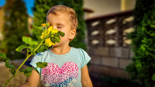 Close-up of cute girl with plants