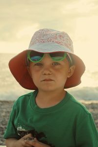 Portrait of young woman wearing hat