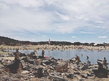 Scenic view of sea against cloudy sky