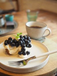 Desert and coffee on table at home
