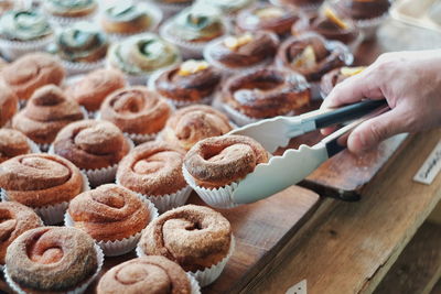 Cropped hand of person holding dessert