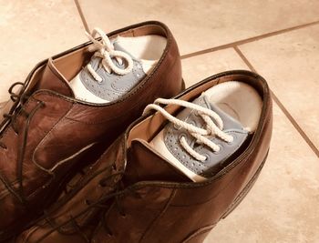 High angle view of shoes on wood