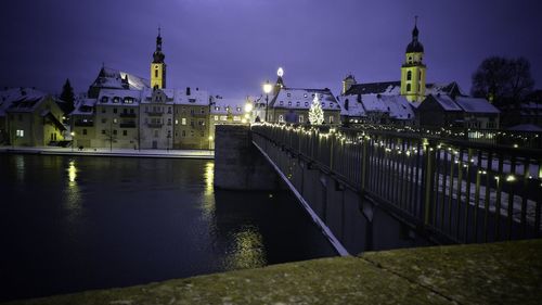 View of illuminated city at night