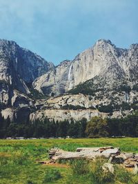 Scenic view of landscape and mountains against sky