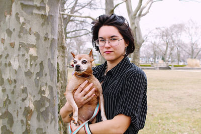 Portrait of woman with dog