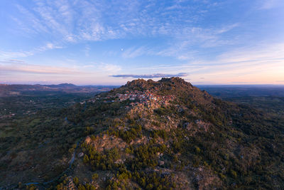 Drone aerial panorama view of monsanto historic village at sunset, in portugal