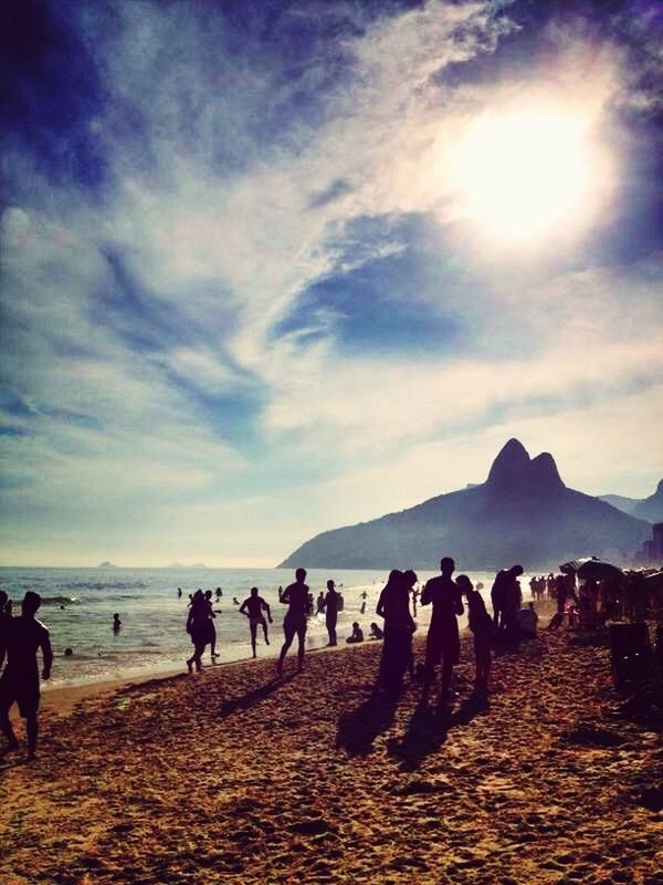 sky, large group of people, beach, sea, cloud - sky, water, leisure activity, shore, lifestyles, sand, vacations, men, scenics, person, mixed age range, tourist, cloud, beauty in nature, tourism