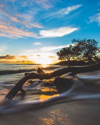 Scenic view of sea against sky during sunset