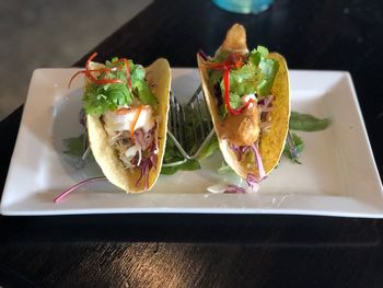 High angle view of food served in plate on table