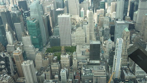 High angle view of modern buildings in city