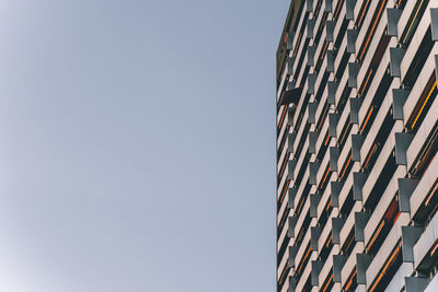 Low angle view of modern building against clear sky