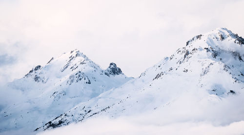 Panoramic view of mountains near brianson, serre chevalier resort, france. foggy mountain landscape