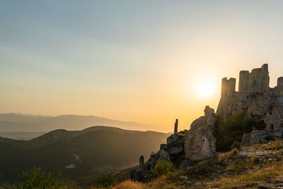 The wonderful rocca calascio castle at sunrise in abruzzo, italy