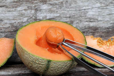 Cantaloupe on wooden table