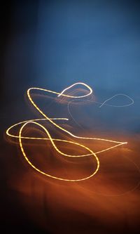 Light painting against blue sky