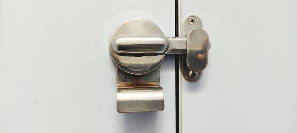 Close-up of open door. lock and unlock.