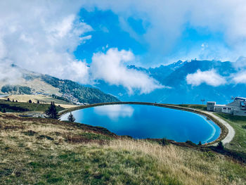 Panoramic view of bridge over mountains against sky