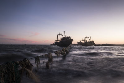 Shipwrecks in the sunrise with amazin dramatic sky