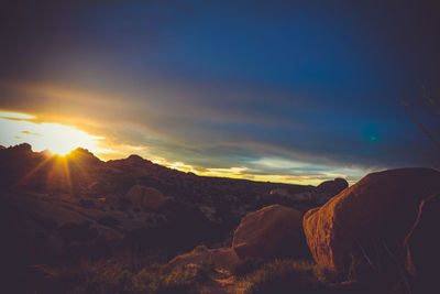 Scenic view of landscape against sky during sunset