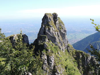 Panoramic view of rocks and mountains against sky