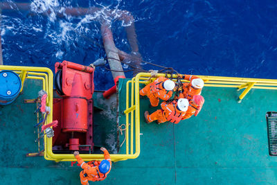 High angle view of people on ship