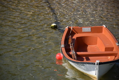 High angle view of boat floating on water