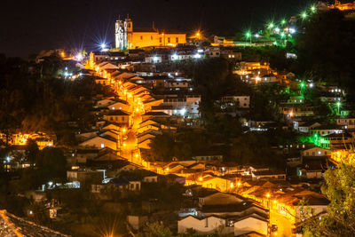 High angle view of illuminated buildings at night