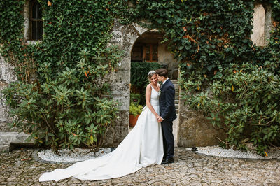 Couple standing in park