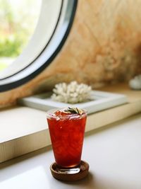 Close-up of drink served on table