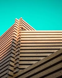 Low angle view of building against clear blue sky