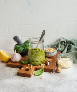 Fresh made pesto sauce. green basil pesto. ingredient for pesto sauce 