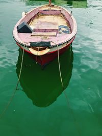 Boat moored in water