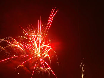 Firework display at night