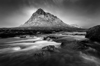 Scenic view of etive river against buachaille etive mor