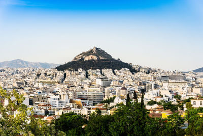 View of cityscape with mountain in background