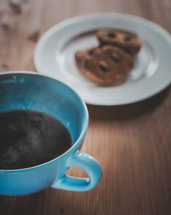 High angle view of coffee cup on table