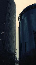 Low angle view of skyscrapers against sky