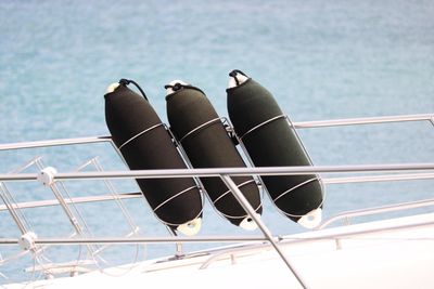 High angle view of railing against sea