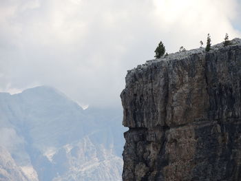 Low angle view of rock formations against sky