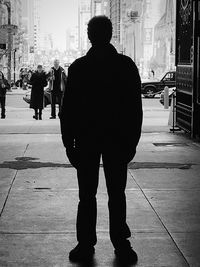 Woman standing in city