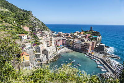 Aerial view of vernazza in the cinque terre with colorful houses and flowers