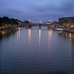 Reflection of illuminated buildings in water