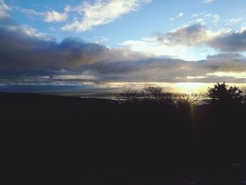 Scenic view of silhouette landscape against sky during sunset