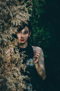 Portrait of a young woman looking away