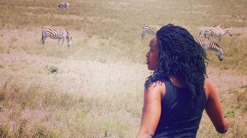 Full length of man standing on field