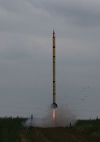 Communications tower against sky