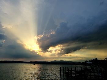 Silhouette of sea at sunset